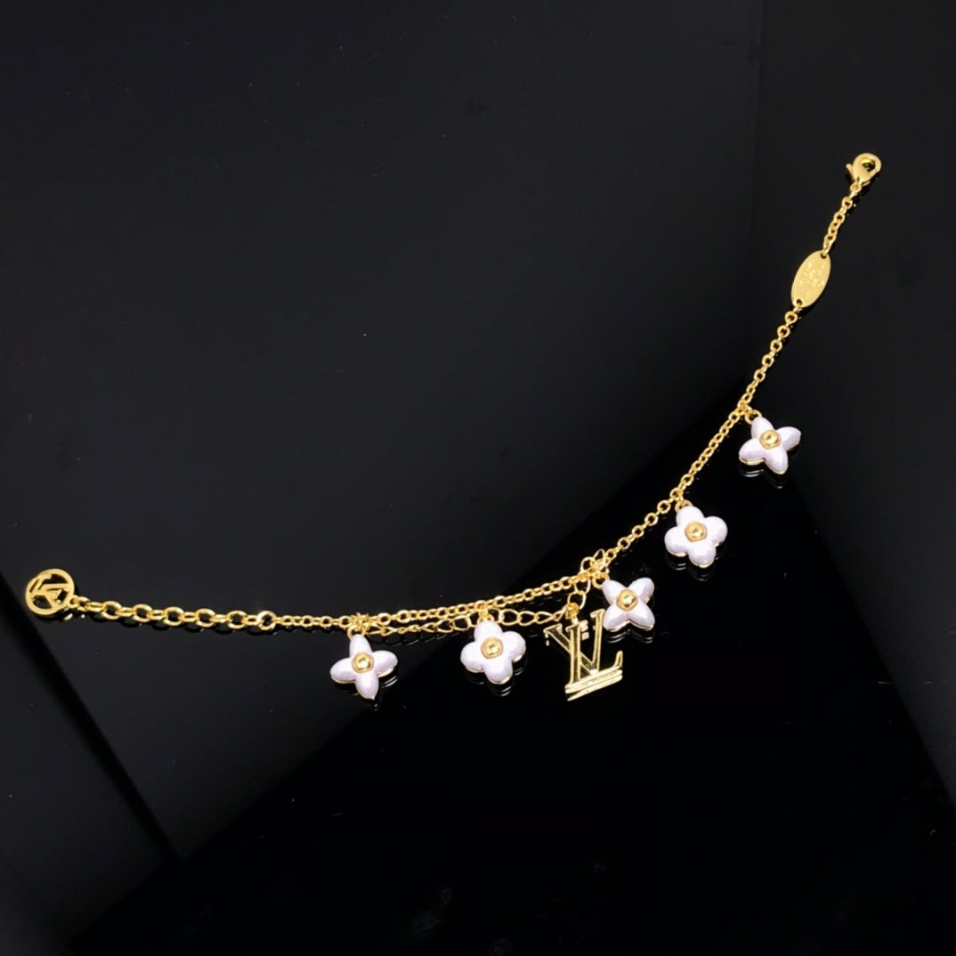 [Novalux]LOGO 6 MOTIF STAR AND SUN GOLD BRACELET