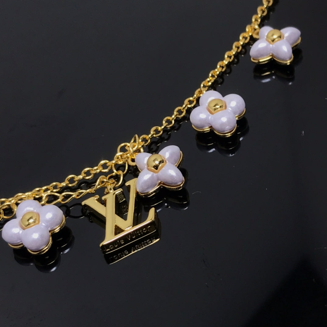 [Novalux]LOGO 6 MOTIF STAR AND SUN GOLD BRACELET