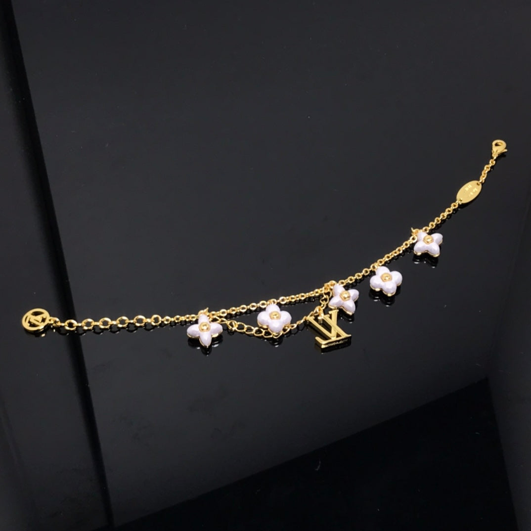 [Novalux]LOGO 6 MOTIF STAR AND SUN GOLD BRACELET